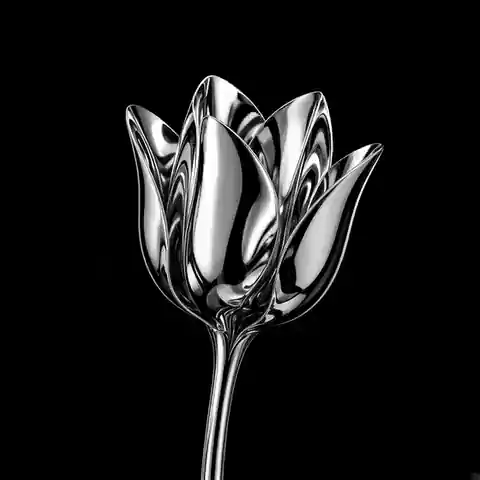 A tulip cast in polished chrome against a black backdrop
